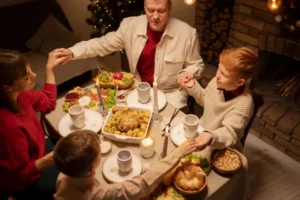 A cozy family dinner table adorned with festive dishes, candles, and holiday decor, capturing a warm moment of togetherness and celebration.