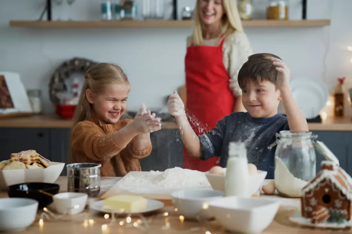 Children playfully sprinkle flour while baking in a cozy kitchen, surrounded by various ingredients and festive decorations.